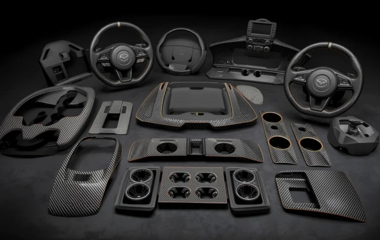 Car interior parts including dashboard trim and center console with carbon fiber hydro dipped finish